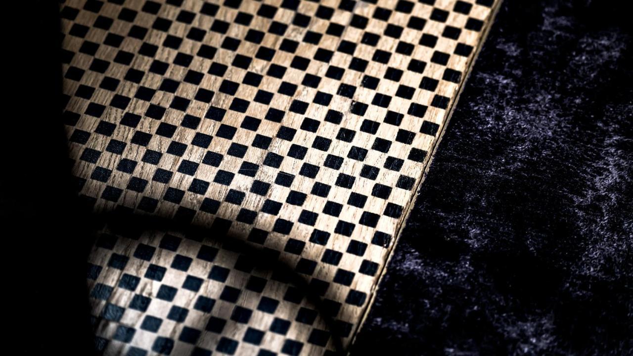 Monsieur George Hotel & Spa - Champs-Elysees Париж Екстер'єр фото A close-up of a piece of perforated leather